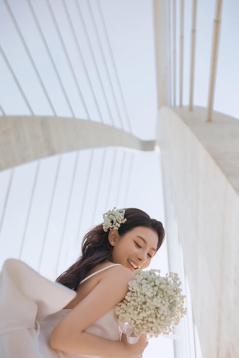 Bride cutting wedding cake